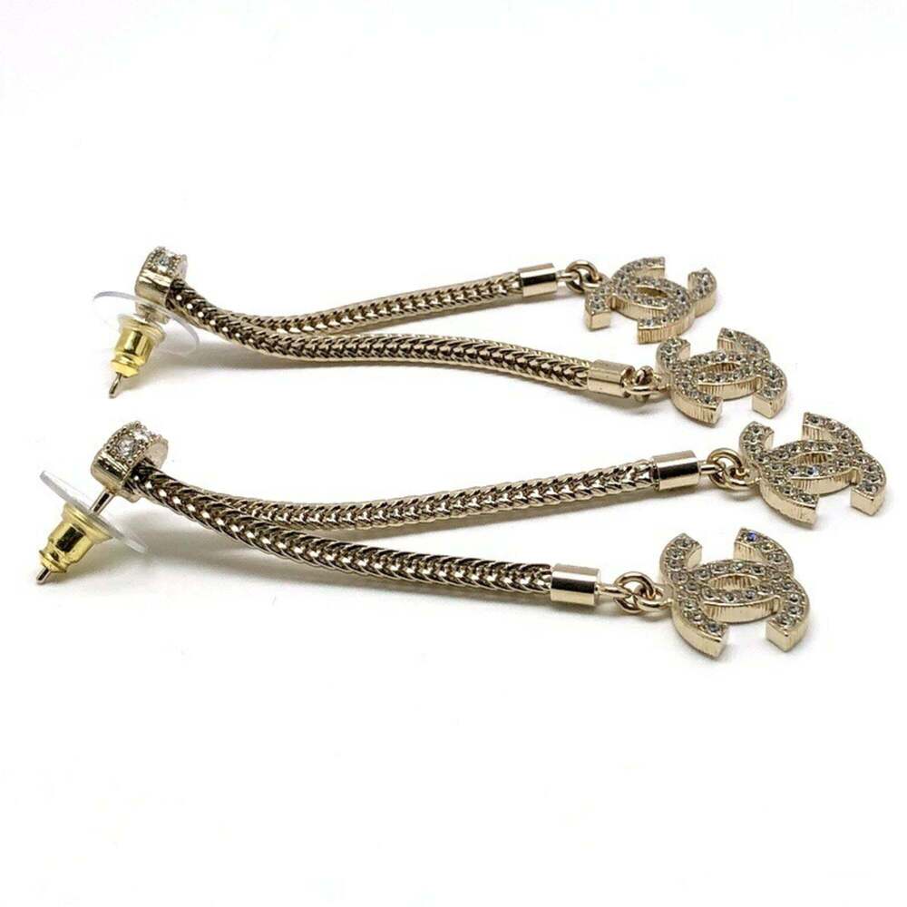 CHANEL Gold Logo Earrings - Picture 2 of 10